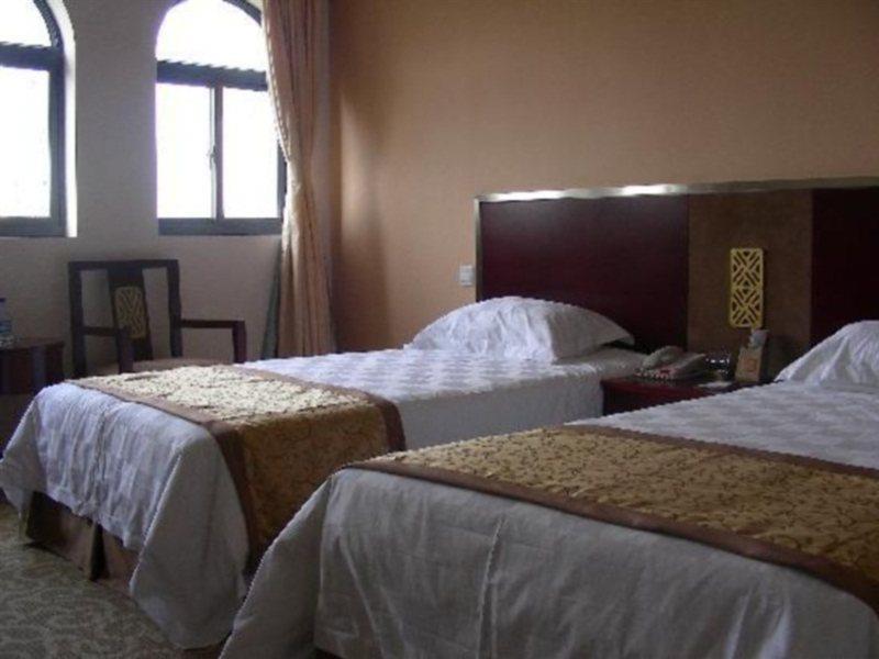 Regius Exhibition Hotel Xangai Quarto foto