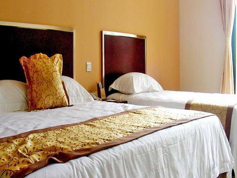 Regius Exhibition Hotel Xangai Quarto foto